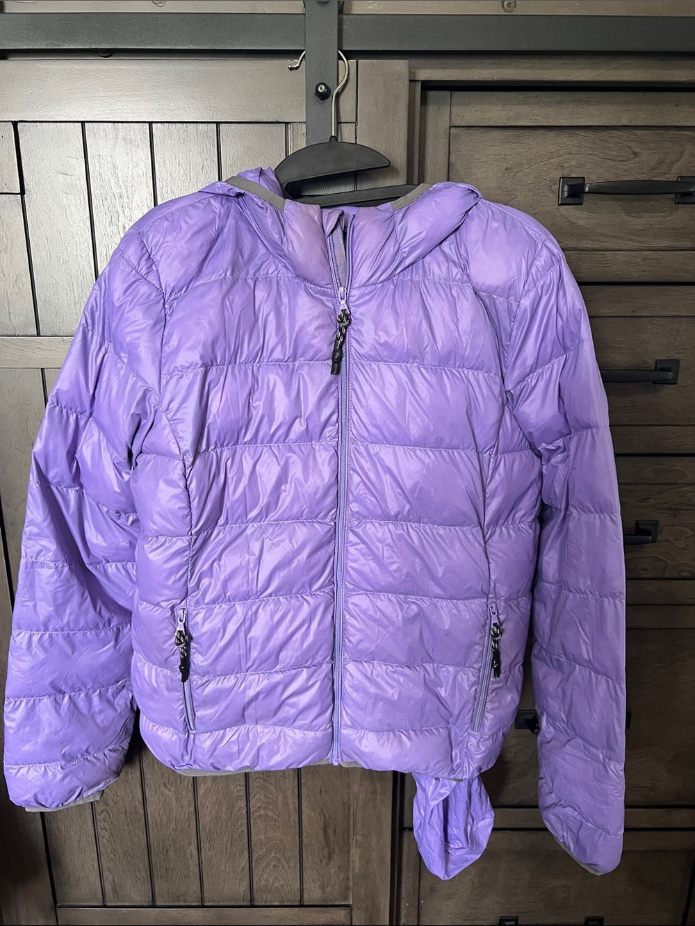 TNA puffer size small.